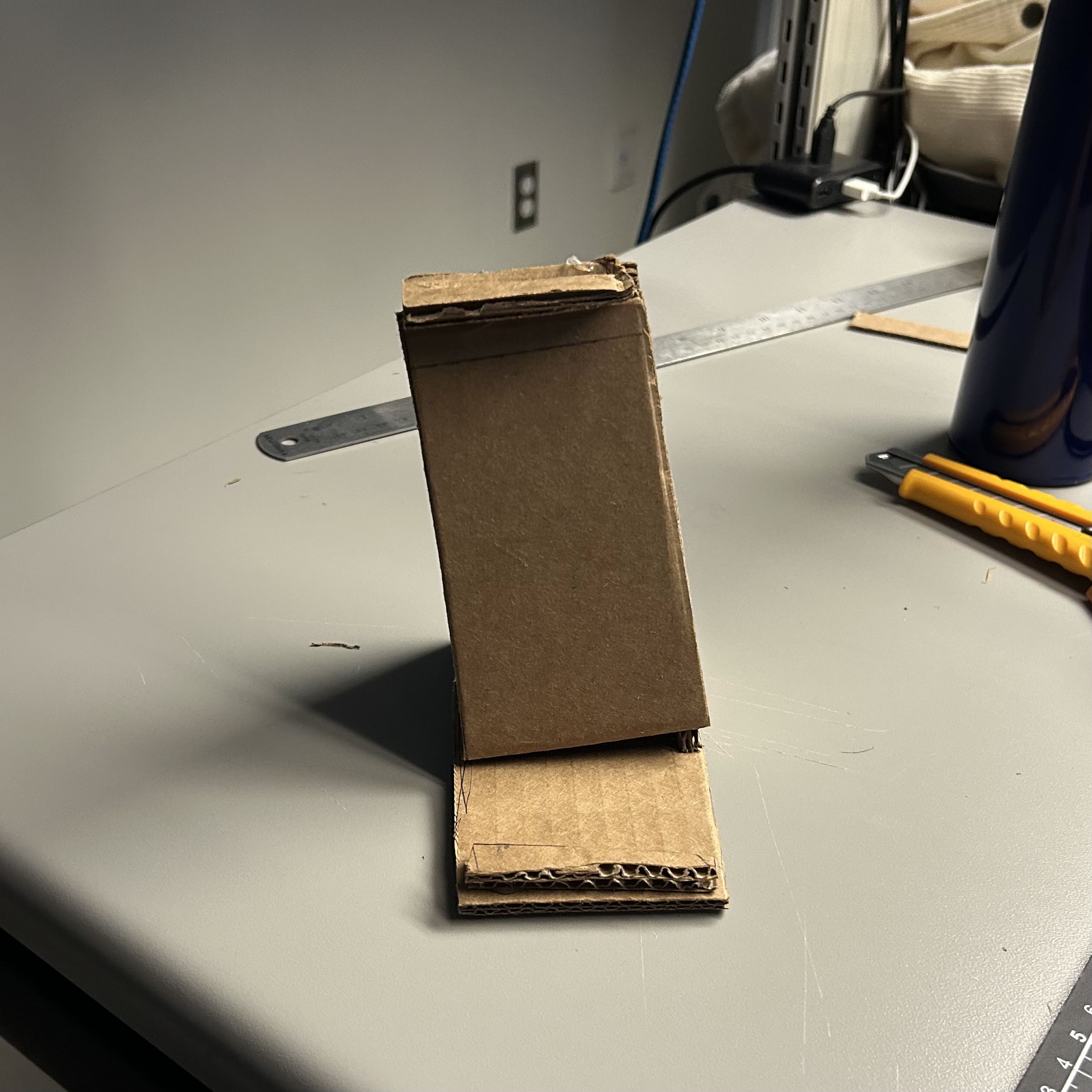 This is the iterative version I developed with my team members after discussions and feedback from others, namely the second version of the phone stand.